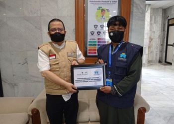 Bank Kalsel Berbagi Bingkisan Makanan Tambahan Gizi di Desa Belandean