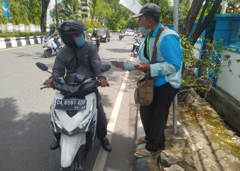 Jelang Lebaran, Jasa Penukaran Uang Tepi Jalan Mulai Ramai 