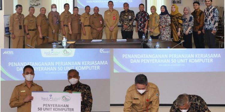 Penandatanganan dilakukan 
oleh Direktur RSUD Ulin, Dr. dr. Izaak Zoelkarnain Akbar Dirut Bank Kalsel 
Hanawijaya. (foto : Humas Bank Kalsel)