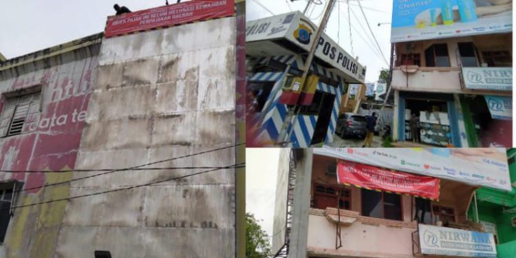 Tiga papan reklame yang belum dibayarkan pajak terpaksa disegel BPKAD Banjarmasin. (foto : shn)