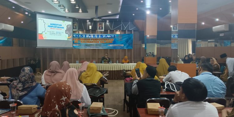 Sosialisasi Pembinaan Perpustakaan se Kabupaten Banjar di Aula Baiman Bappedalitbang. (foto : istimewa)