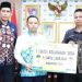 Bupati Tapin Serahkan Beasiswa Satu Desa Satu Sarjana