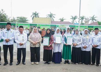 Ketua TP PKK Tapin Hj Faridah Yamani Dukung Penyelenggaraan OMI