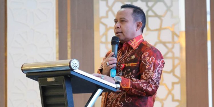 Bupati Tapin H Yamani saat memberikan sambutan pada rapat koordinasi pelaksanaan program kerja. (foto : istimewa)