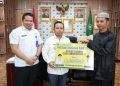 Pemkab Tapin Salurkan Bantuan Haul Datu Muning