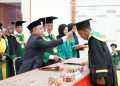Bupati Yamani Hadiri Wisuda Perdana STIT Assuniyah Tambarangan